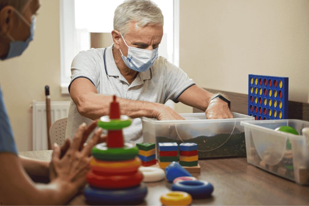 Adult Occupational Therapy - Adult Performing Therapy with Mustard Seeds Occupational Therapist