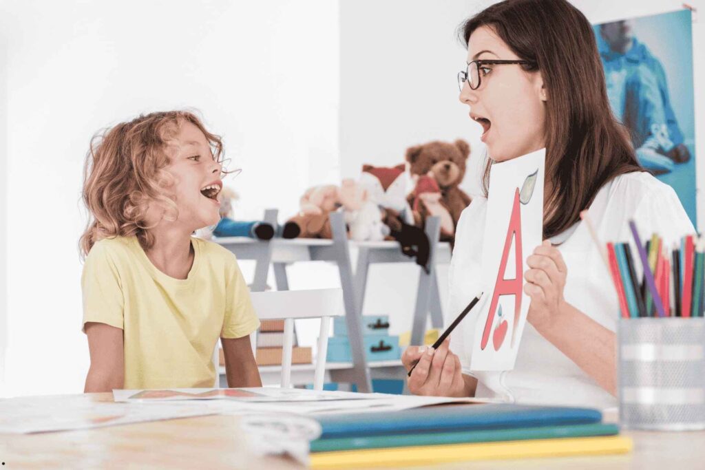 Getting Started with Therapy in Nevada - SLP with a Child doing Therapy